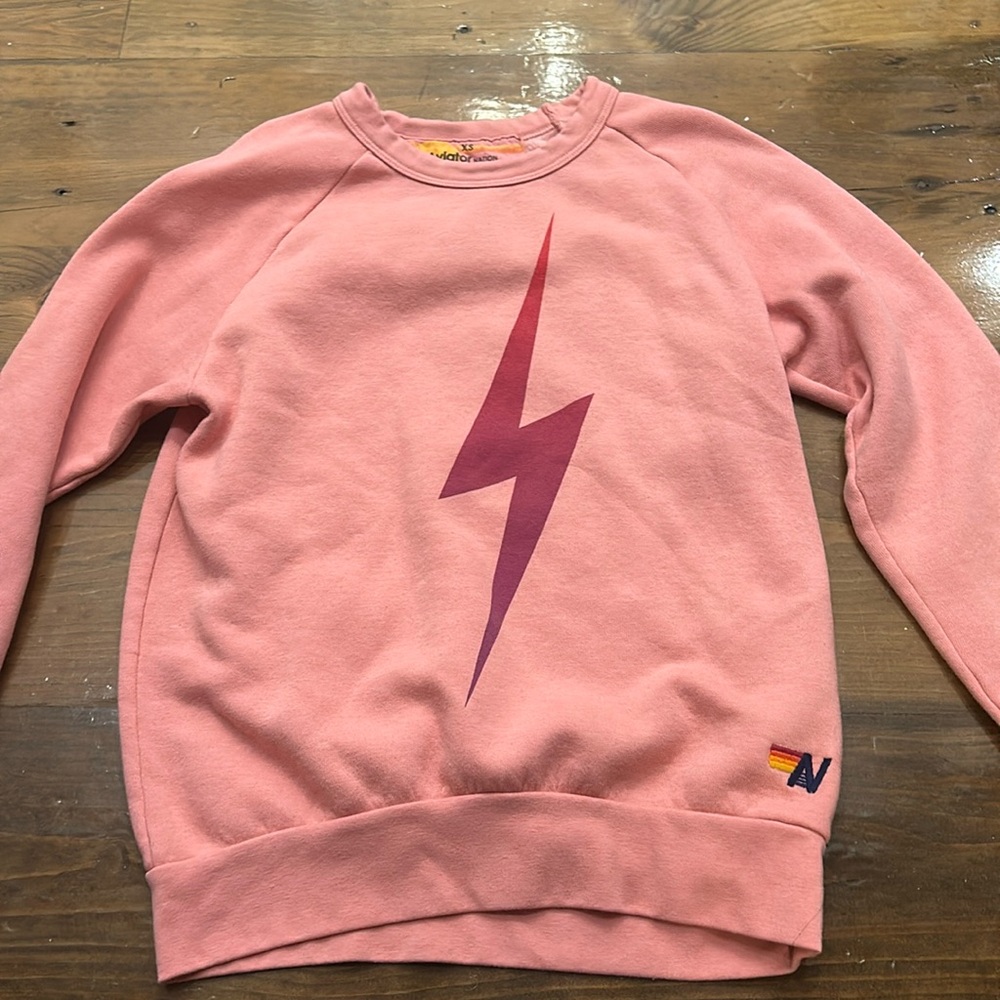 Aviator Nation pink crew neck with ombré pink and purple lightning bolt